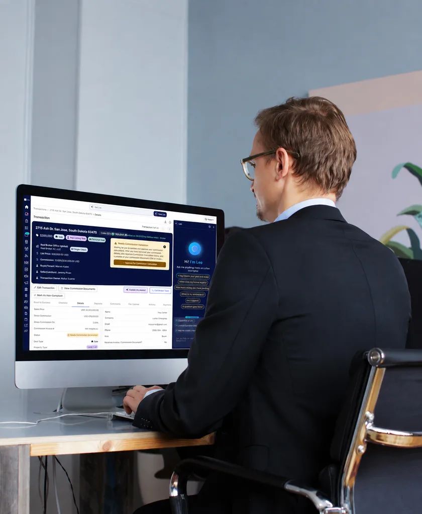 A man at a desktop computer using the dashboard with LEO open
